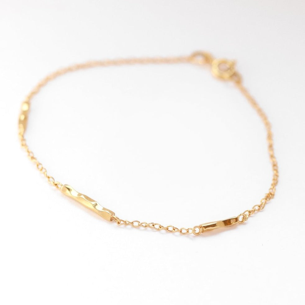 Belle Smith at E.C.One London gold facet bar bracelet