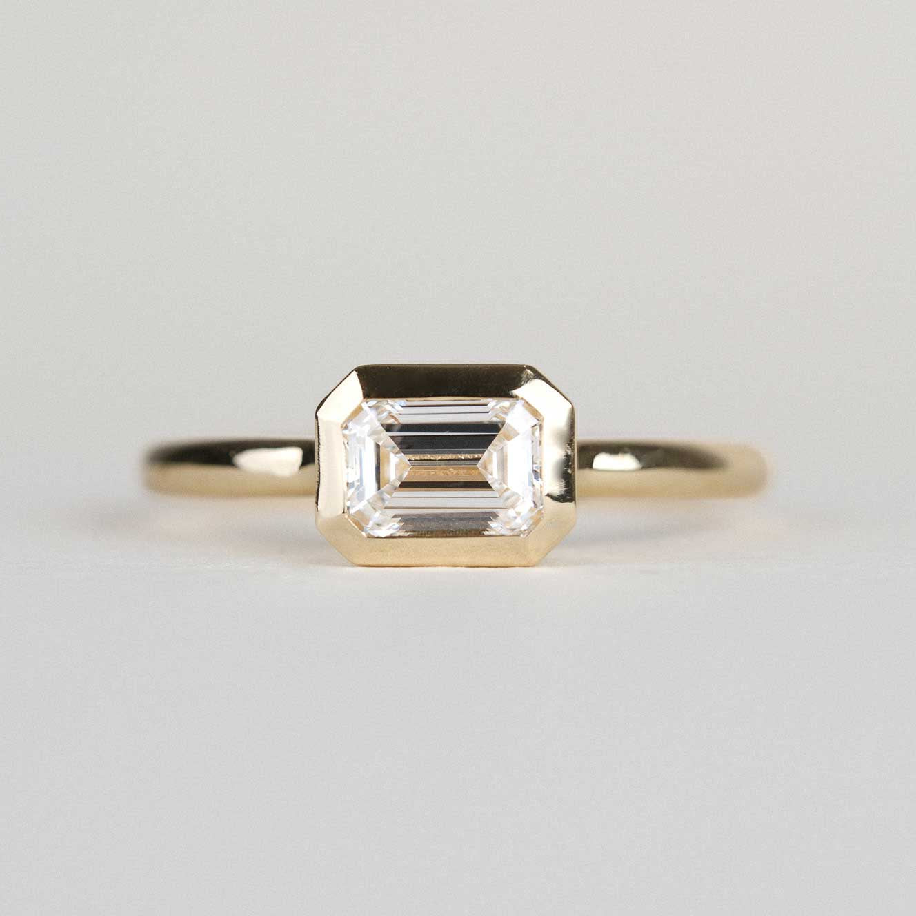 E.C.One AVA Yellow Gold Emerald Cut Diamond Engagement Ring hand made in our B Corp London workshop