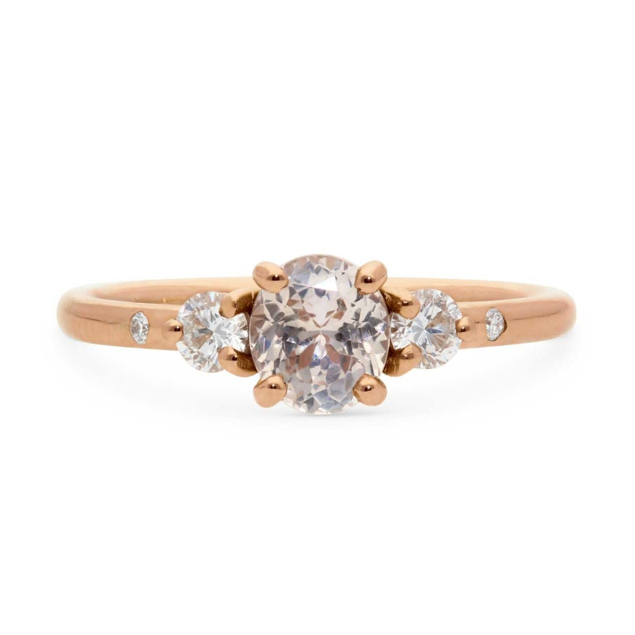 E.C. One ethical peach sapphire and diamond Celeste engagement ring made in our London B Corp Workshop