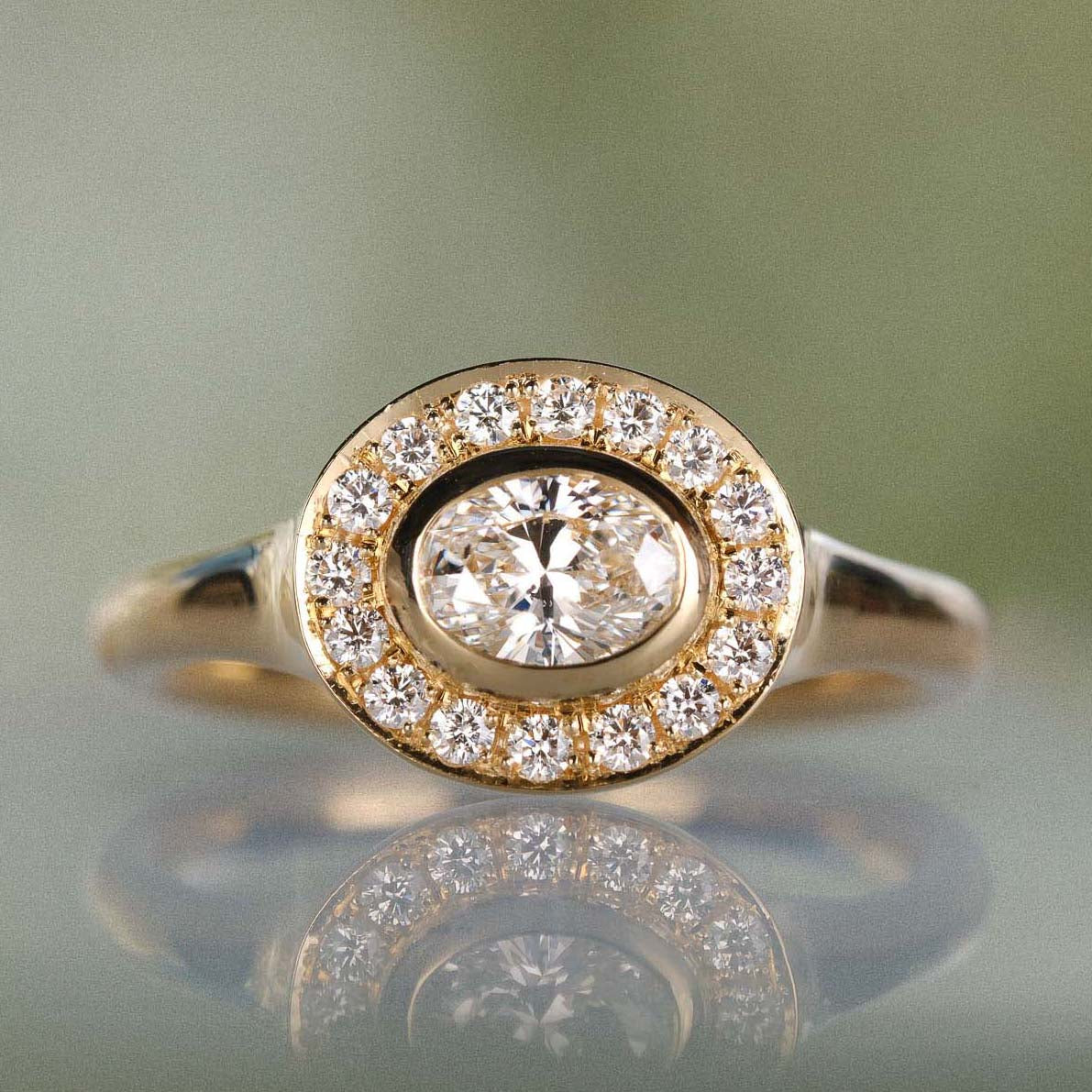 FRAME Oval Diamond Gold Ring with Diamond Halo by ethical jewellers E.C.One London, made in our B Corp London workshop