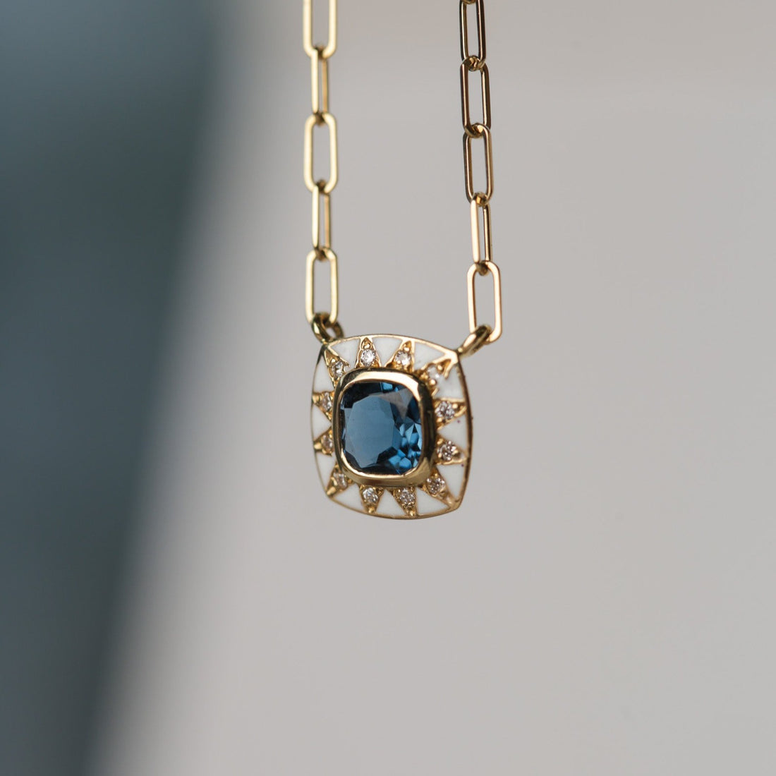 STELLA Gold Necklace with London Blue topaz and White Enamel by Van Den Abeele at EC One London