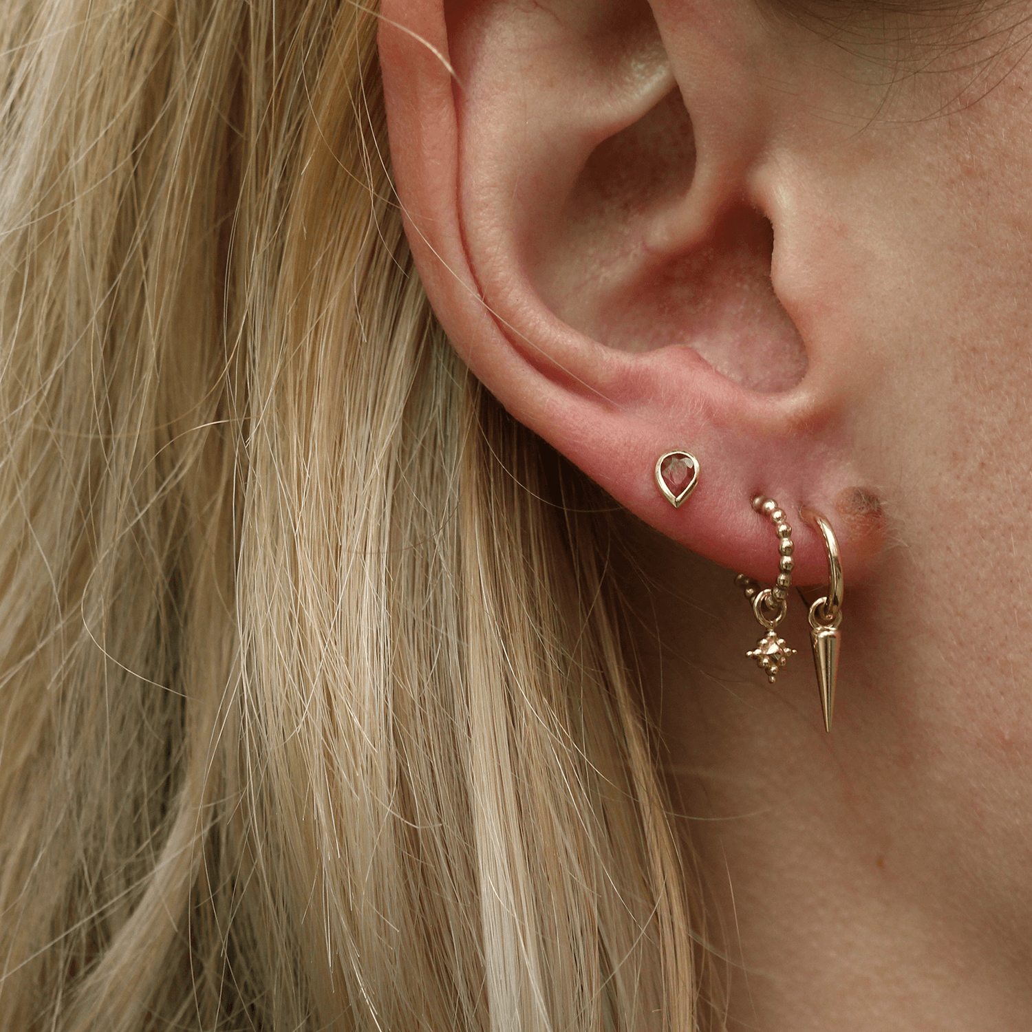 Pear Ruby Gold Studs Pair