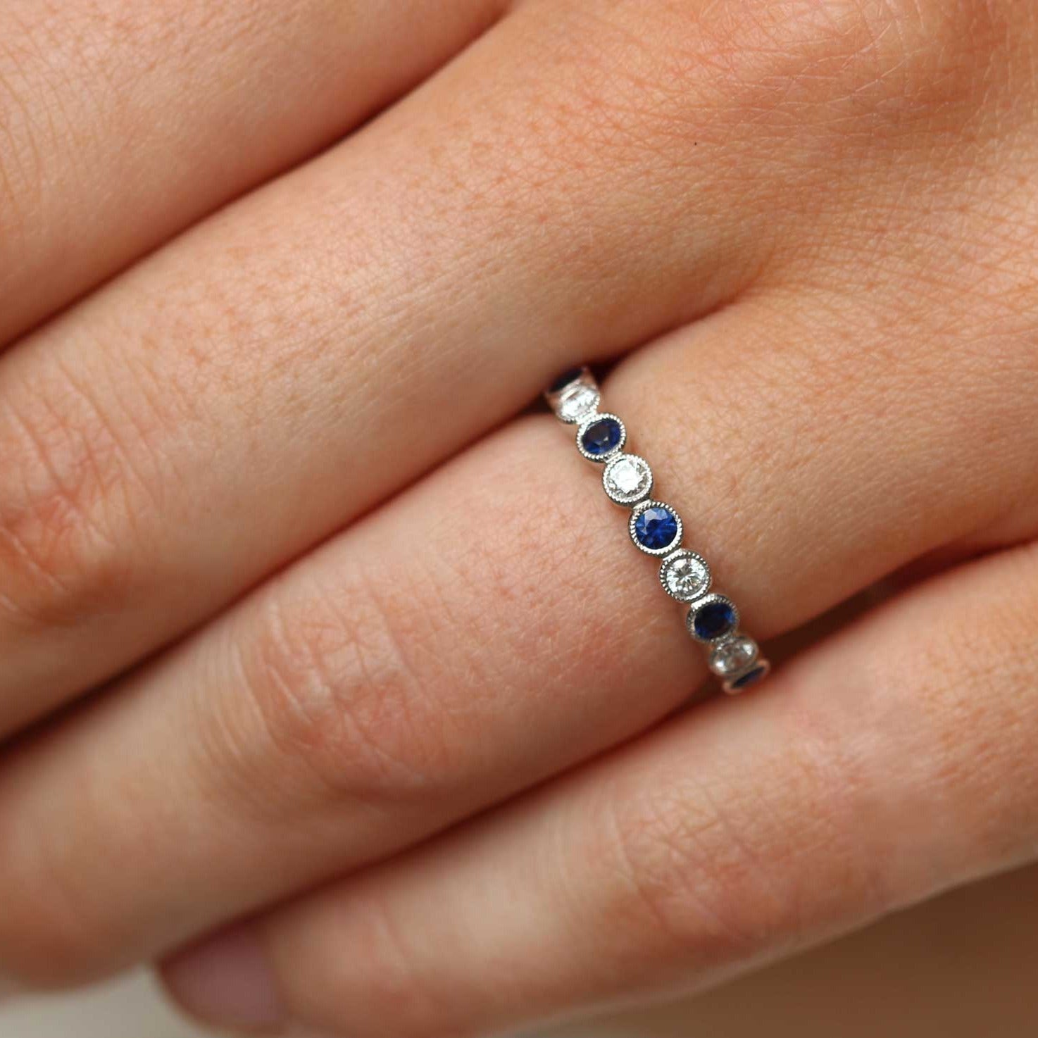 Ungar and Ungar Blue Sapphire and Diamond Half Eternity Ring Platinum at EC One London